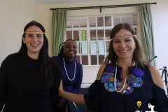 (Left) Laura Lapalma from FARN, Argentina, (middle) Vivian Wangechi from Kenya, and (right) Ivannai Ayelas wear the traditional headbands that were gifted by Rodah