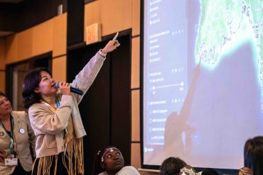 Sunita Kwangta locating the Kheshorter Community Forest in the digital maps of the UN Biodiversity Lab