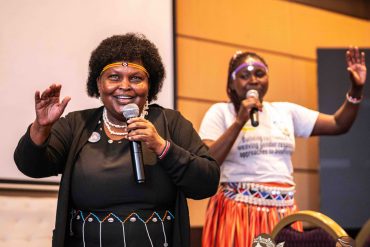 Rodah Rotino (left) and Irene Arono (right) from Pastoral Communities Empowerment Program (PACEP), Kenya sharing a traditional song sung by the community women