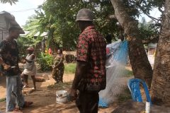 Locals prepare fishing nets